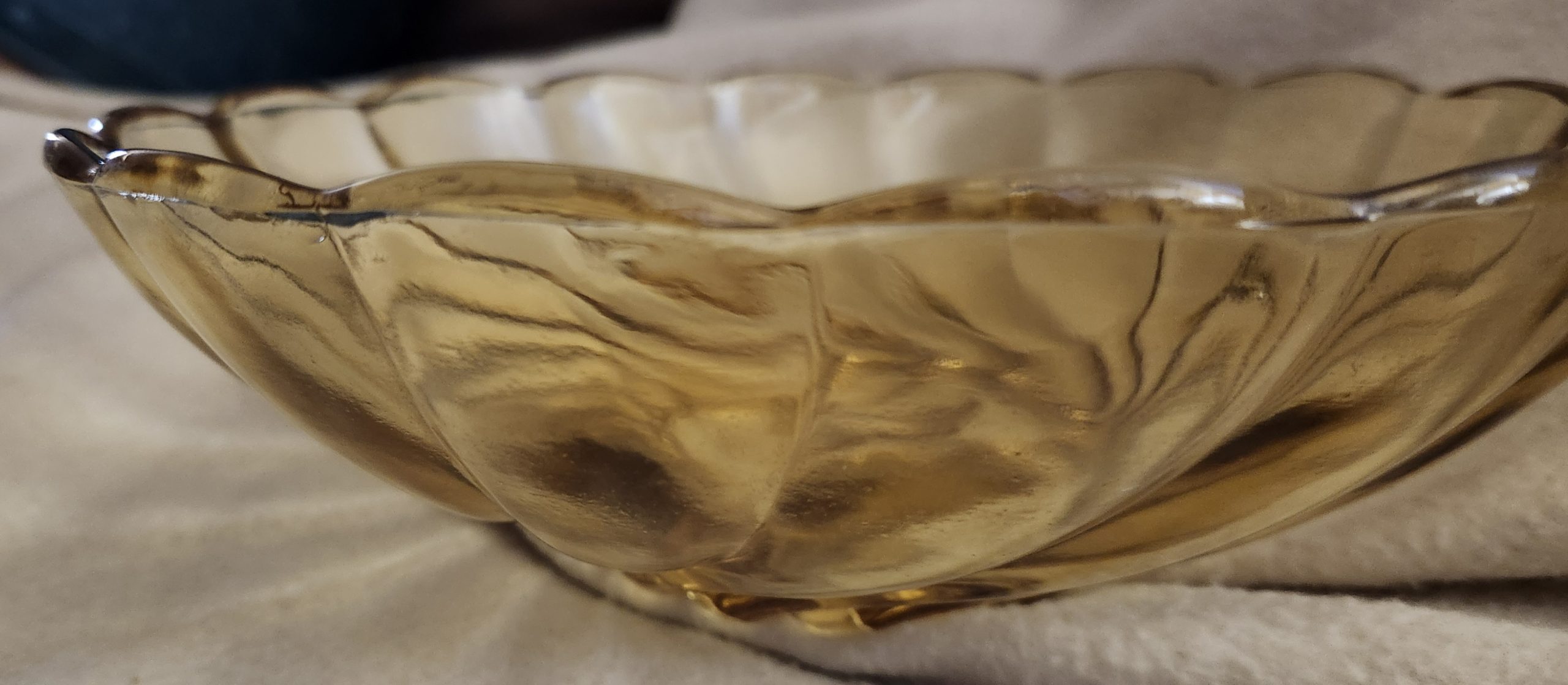 side view of amber glass bowl side view